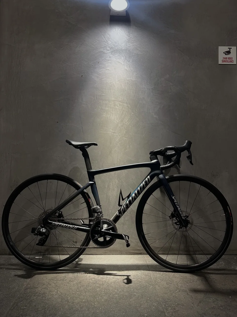 Black Specialized road bike photographed in the Velox studio