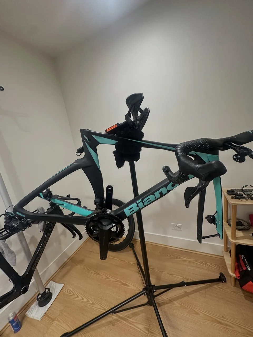Bianchi frame in a work stand at Velox Bike Studio